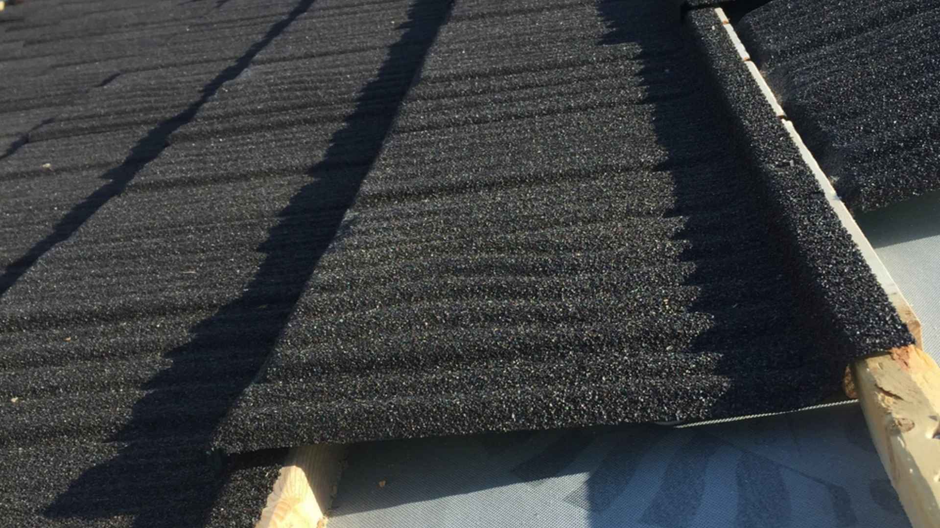 Can a Metal Roof Be Installed Directly Over an Asphalt Shingle Roof in Storm-Prone Areas?